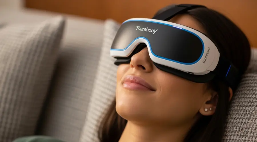 A woman relaxing with Therabody SmartGlasses for headache and migraine relief
